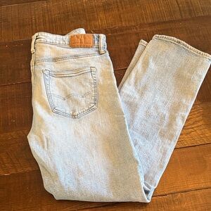 American Eagle Outfitters Light Blue Jeans with Brown Patch